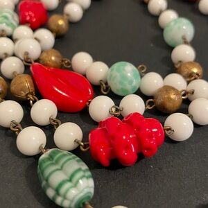 Colorful Beaded Necklace. 27” long and very heavy.